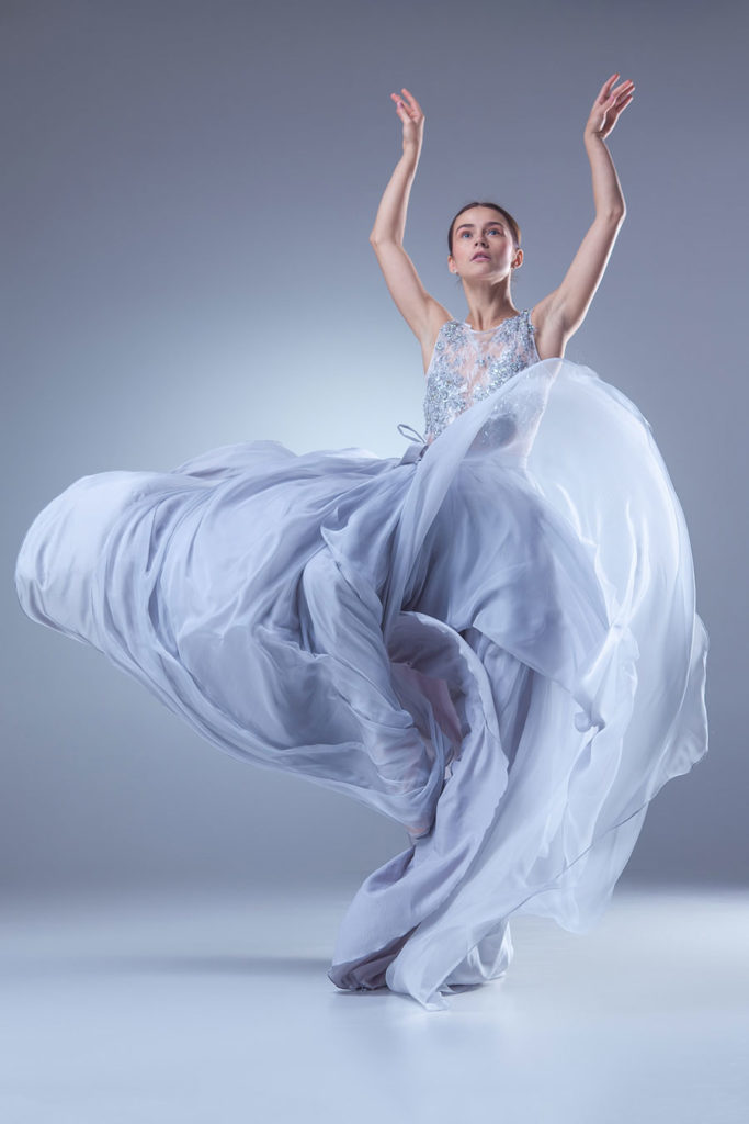 photodune-13084801-the-beautiful-ballerina-dancing-in-blue-long-dress-m-683x1024