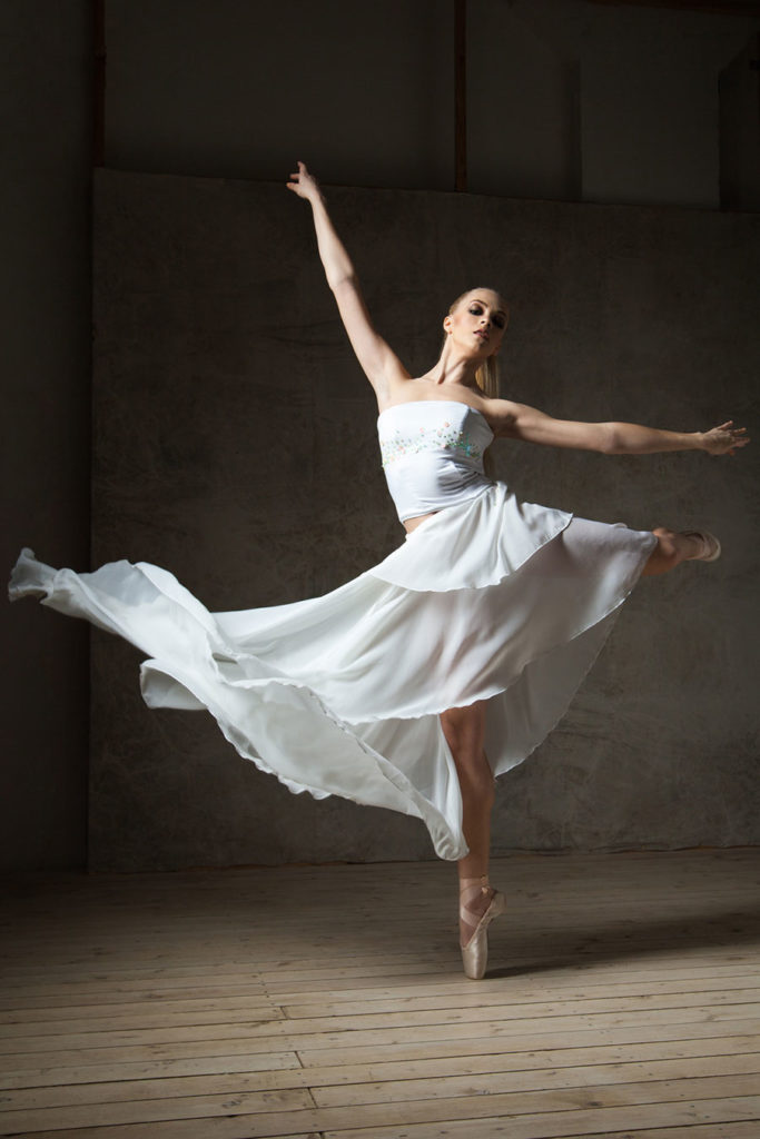 photodune-17229838-beautiful-ballet-dancer-in-white-costume-with-waving-skirt-dancing-m-683x1024